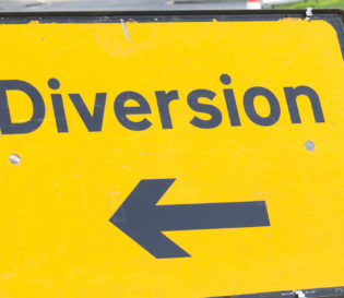 Streetworks diversion sign. Signing, lighting and guarding reassessment.